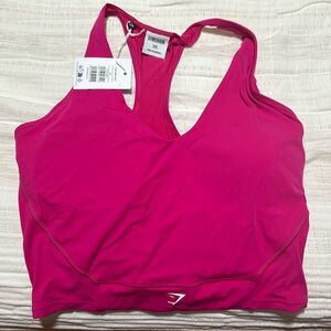 Gymshark crop mesh tank. Never worn. Was just too big for me.